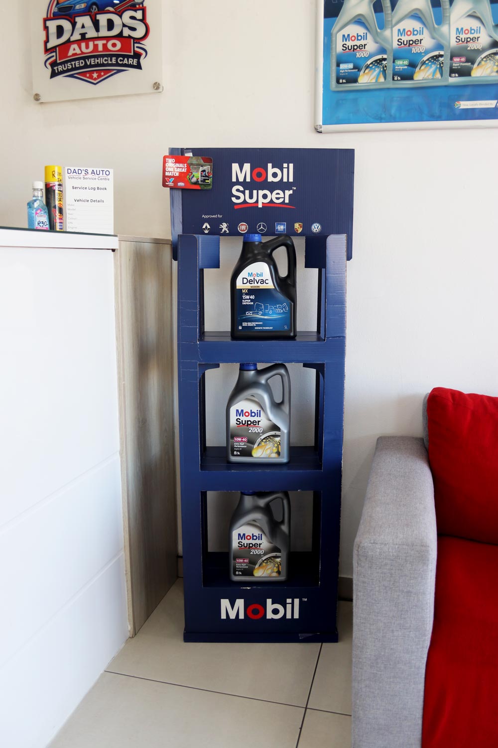 Mobil Super engine oil display in the DAD'S Auto reception