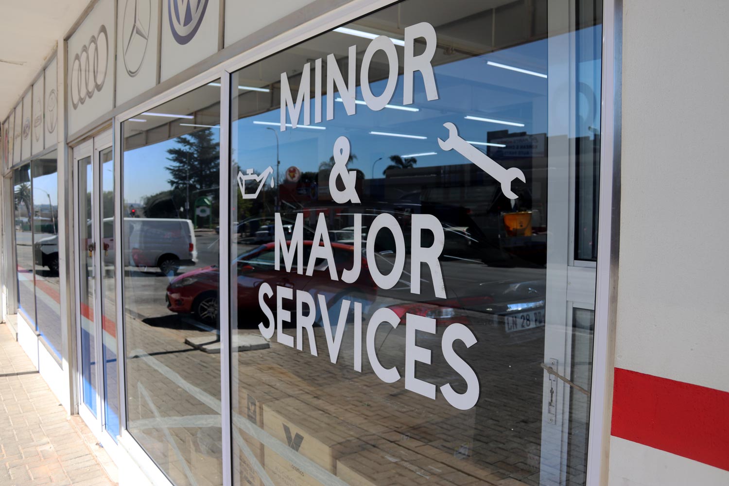 Minor and Major Services signage on the workshop window