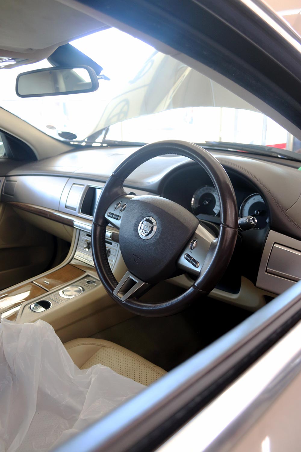 Interior of a Jaguar XF being serviced at DAD'S Auto
