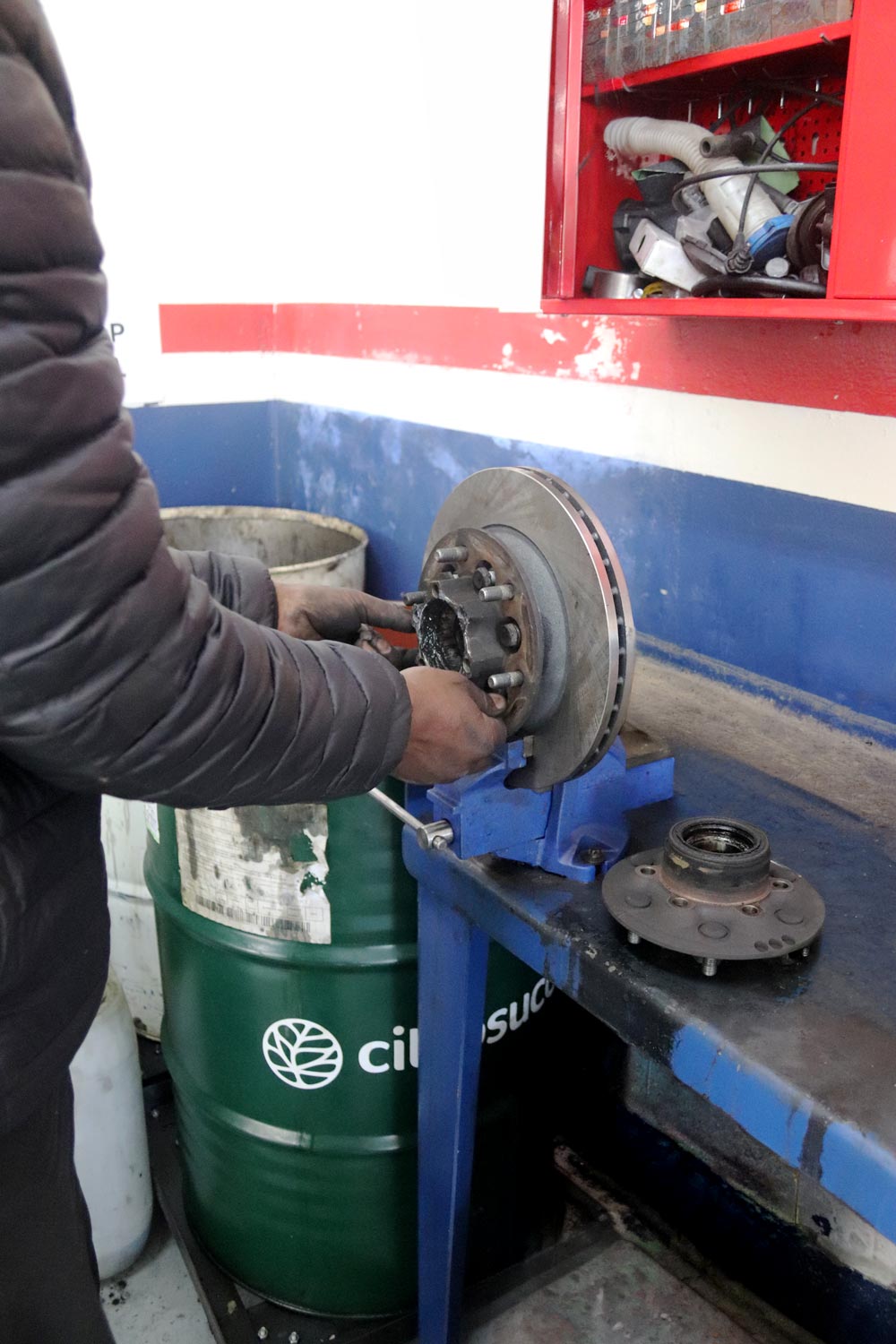 Brake disc and hub being reconditioned on the workshop bench